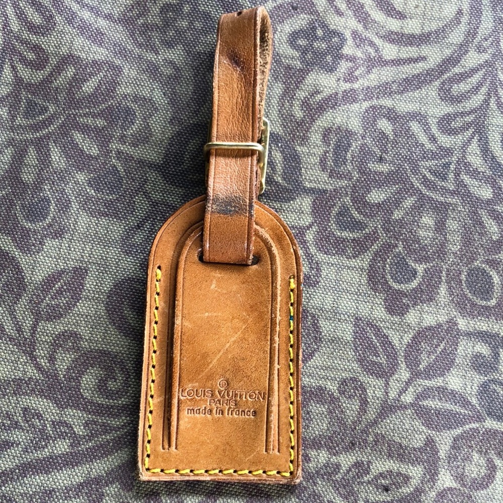 Louis Vuitton Brown Leather Bag with Classic Design